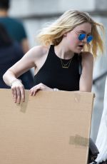 DAKOTA FANNING in Tank Top Out in New York 06/26/2015