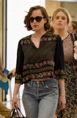 DAKOTA JOHNSON at Barcelona–el Prat Airport in Barcelona