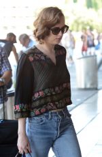 DAKOTA JOHNSON at Barcelona–el Prat Airport in Barcelona