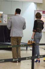 DAKOTA JOHNSON at Barcelona–el Prat Airport in Barcelona