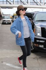 DAKOTA JOHNSON at LAX Airport in Los Angeles 06/05/2015