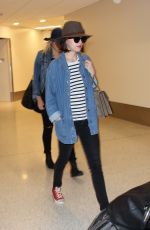 DAKOTA JOHNSON at LAX Airport in Los Angeles 06/05/2015