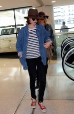 DAKOTA JOHNSON at LAX Airport in Los Angeles 06/05/2015