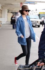 DAKOTA JOHNSON at LAX Airport in Los Angeles 06/05/2015