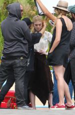 ELLE FANNING on the Set of a Photoshoot in Malibu 06/17/2015