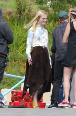 ELLE FANNING on the Set of a Photoshoot in Malibu 06/17/2015
