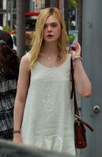 ELLE FANNING Shopping at Giuseppe Zanotti Store in Beverly Hills 06/11/2015