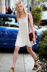 ELLE FANNING Shopping at Giuseppe Zanotti Store in Beverly Hills 06/11/2015