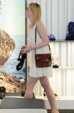 ELLE FANNING Shopping at Giuseppe Zanotti Store in Beverly Hills 06/11/2015