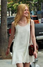 ELLE FANNING Shopping at Giuseppe Zanotti Store in Beverly Hills 06/11/2015
