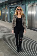 ELLIE GOULDING at Heathrow Airport in London 06/13/2015