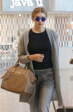 GIGI HADID at Pierre Elliott Trudeau Airport in Montreal 06/05/2015