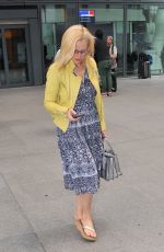 GILLIAN ANDERSON at Heathrow Airport in London 06/25/2015