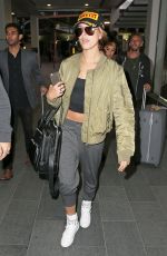 HAILEY BALDWIN Arrives at Airport in Sydney 06/29/2015