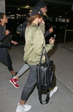 HAILEY BALDWIN Arrives at Airport in Sydney 06/29/2015