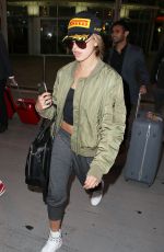 HAILEY BALDWIN Arrives at Airport in Sydney 06/29/2015