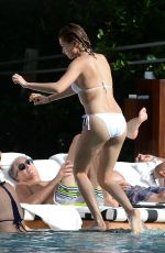HAILEY BALDWIN in Bikni at a Pool in Miami 06/12/2015