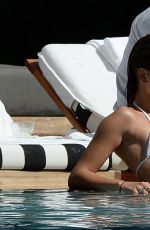 HAILEY BALDWIN in Bikni at a Pool in Miami 06/12/2015