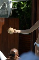 HAILEY BALDWIN in Bikni at a Pool in Miami 06/12/2015