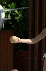 HAILEY BALDWIN in Bikni at a Pool in Miami 06/12/2015