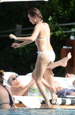 HAILEY BALDWIN in Bikni at a Pool in Miami 06/12/2015