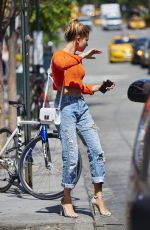 HAILEY BALDWIN in Ripped Jeans Out and About in New York 06/17/2015
