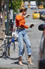 HAILEY BALDWIN in Ripped Jeans Out and About in New York 06/17/2015