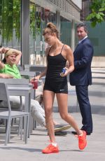 HAILEY BALDWIN in Spandex Shorts Out and Aboou in New York 06/17/2015