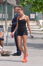 HAILEY BALDWIN in Spandex Shorts Out and Aboou in New York 06/17/2015