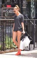 HAILEY BALDWIN in Spandex Shorts Out and Aboou in New York 06/17/2015