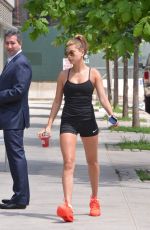 HAILEY BALDWIN in Spandex Shorts Out and Aboou in New York 06/17/2015