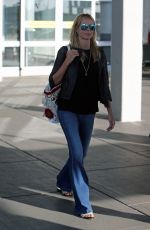 HEIDI KLUM at JFK Airport in New York 06/07/2015