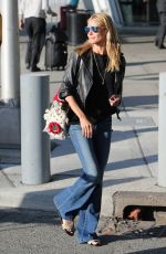 HEIDI KLUM at JFK Airport in New York 06/07/2015