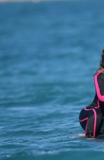 MARIAH CAREY in Wetsuit at a Beach in Italy 06/22/2015