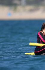 MARIAH CAREY in Wetsuit at a Beach in Italy 06/22/2015