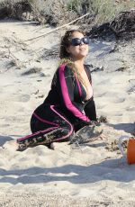 MARIAH CAREY in Wetsuit at a Beach in Italy 06/22/2015