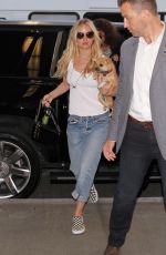JENNIFER LAWRENCE in Jeans at Los Angeles International Airport