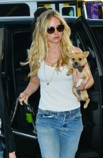 JENNIFER LAWRENCE in Jeans at Los Angeles International Airport