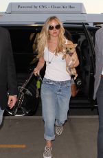 JENNIFER LAWRENCE in Jeans at Los Angeles International Airport