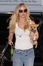 JENNIFER LAWRENCE in Jeans at Los Angeles International Airport