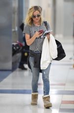 KATE HUDSON in Jeans at JFK International Airport in New York 06/03/2015