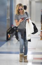 KATE HUDSON in Jeans at JFK International Airport in New York 06/03/2015