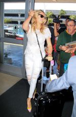KATE UPTON at LAX Airport in Los Angeles 06/18/2015
