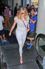 KATE UPTON at LAX Airport in Los Angeles 06/18/2015