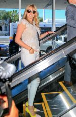 KATE UPTON at LAX Airport in Los Angeles 06/18/2015