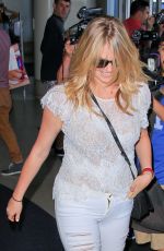 KATE UPTON at LAX Airport in Los Angeles 06/18/2015