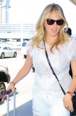 KATE UPTON at LAX Airport in Los Angeles 06/18/2015