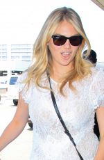 KATE UPTON at LAX Airport in Los Angeles 06/18/2015