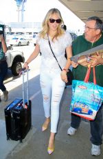KATE UPTON at LAX Airport in Los Angeles 06/18/2015
