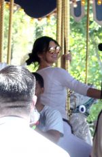 KENDALL JENNER at Disneyland for North West